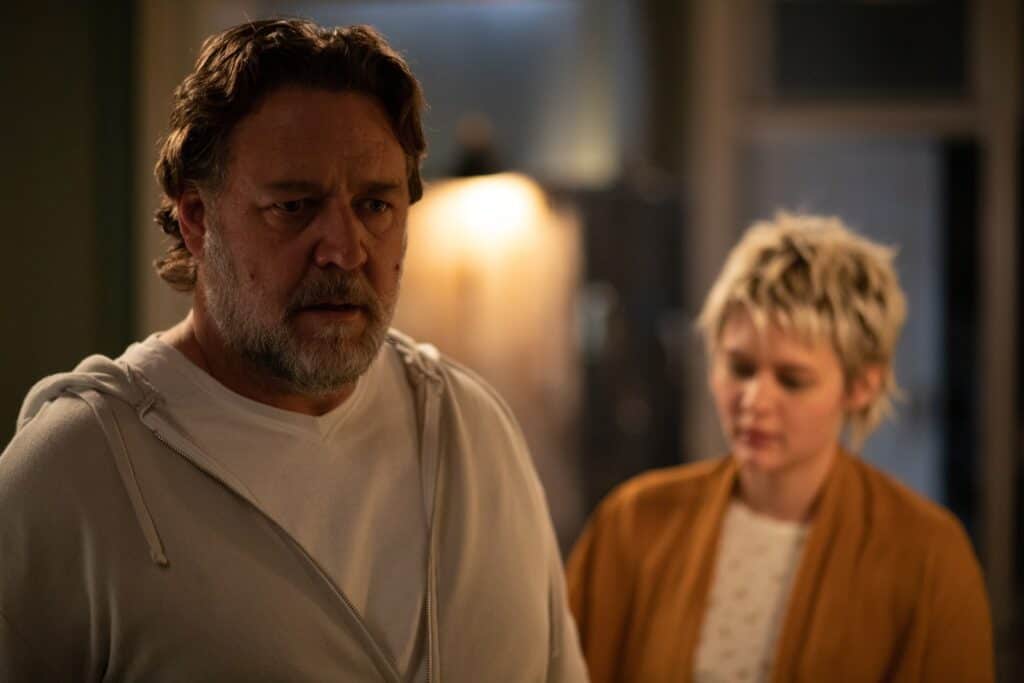 Russell Crowe and Ryan Simpkins in The Exorcism